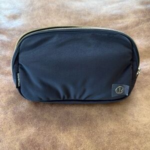 lululemon athletica Black Crossbody Bag with Gold Accents